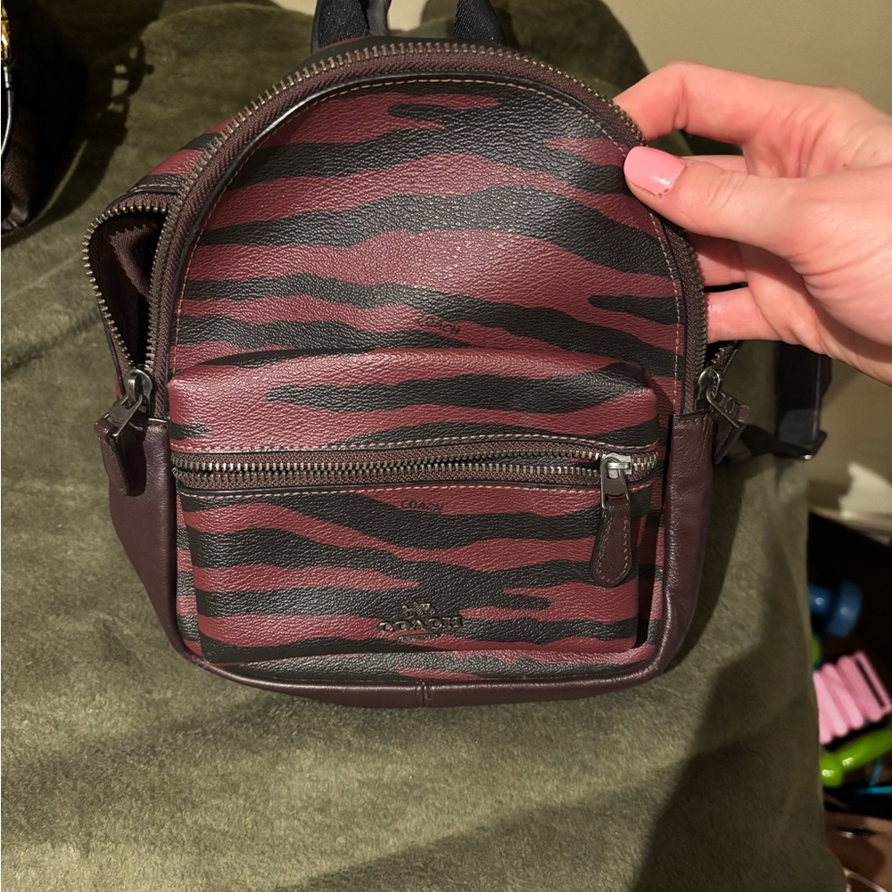 Coach Burgundy and Black Zebra Print Leather Mini Backpack